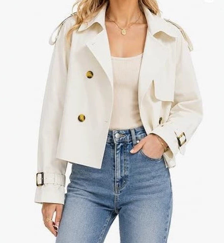 White short double-breasted trench coat with flap pockets and gold buttons