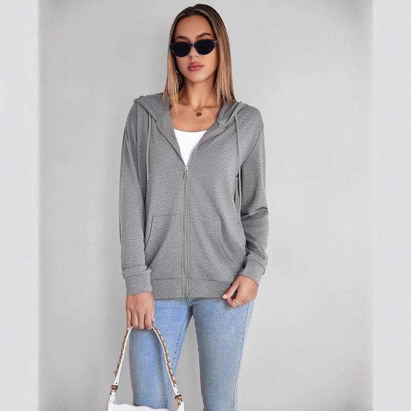 Gray zip-up hoodie with hood, zipper closure, and front kangaroo pocket