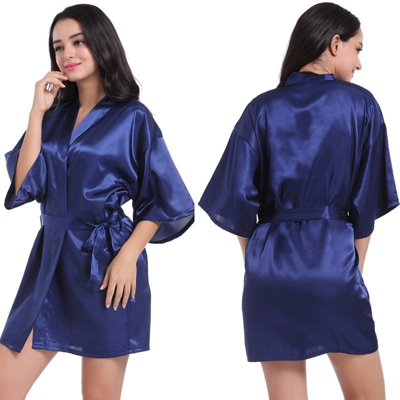 Blue satin short robe with V-neck and tied waist belt, short kimono sleeves.
