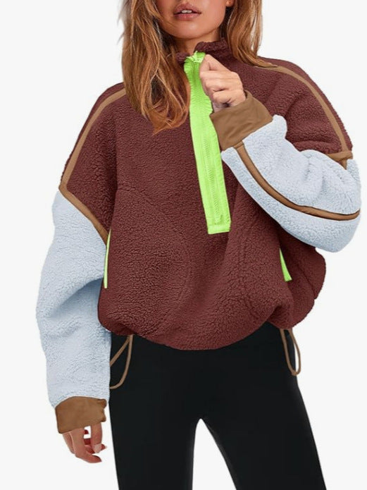 Plush quarter-zip sweatshirt in brown with neon green trim and pull tab