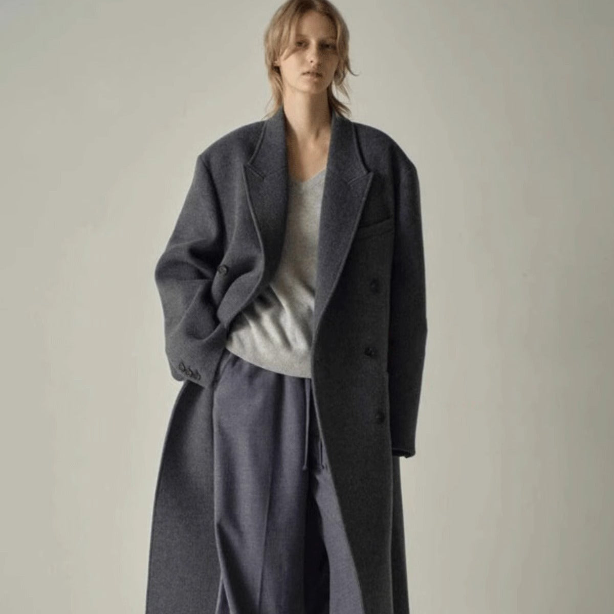 Charcoal long wool coat, relaxed fit, double-breasted front with wide lapels