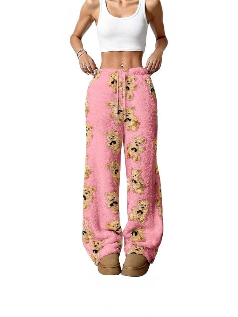 Loose fleece pants in pink with teddy bear print, drawstring waist