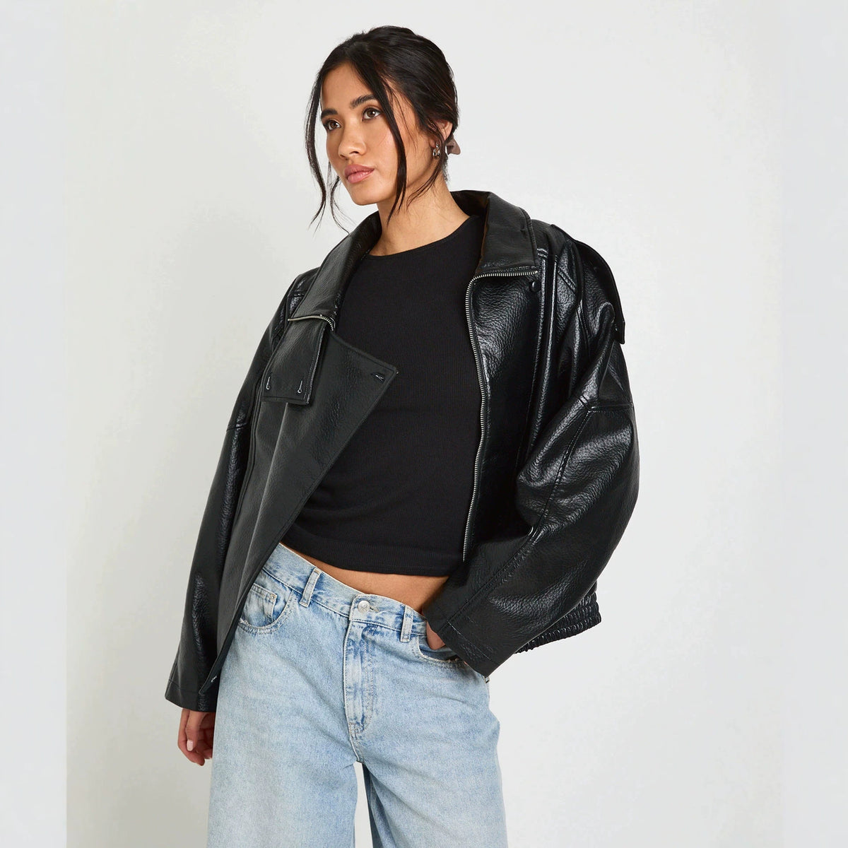 Black PU leather biker jacket with stand-up collar and zip, side chest pocket.