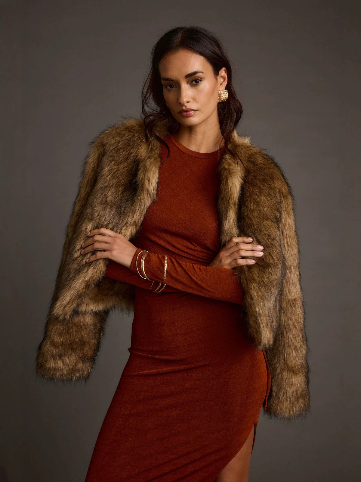 Women’s brown faux fur short coat with open front and shaggy collar, long sleeves