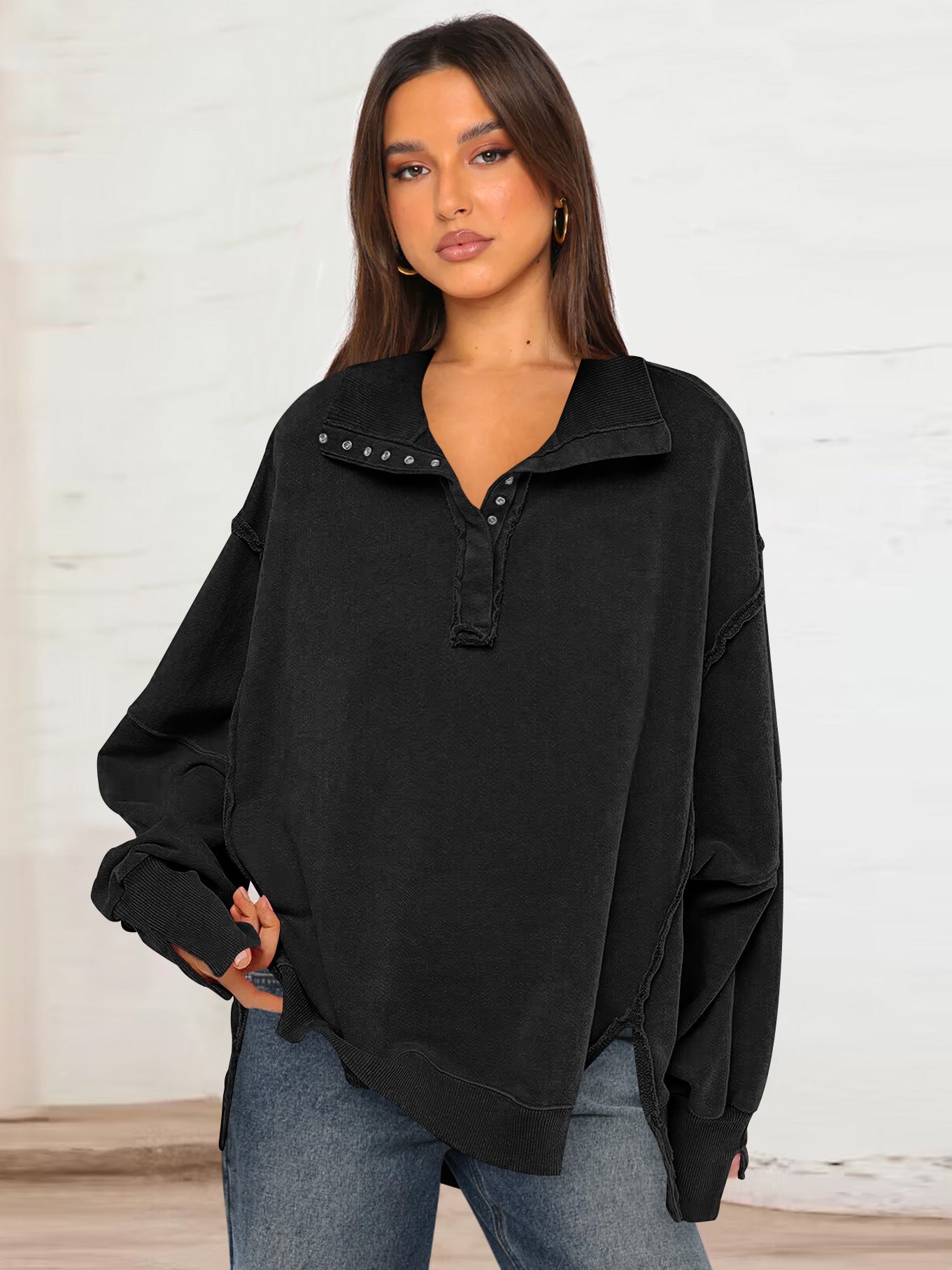 Women's black polo-collar sweatshirt top with button placket and lantern sleeves