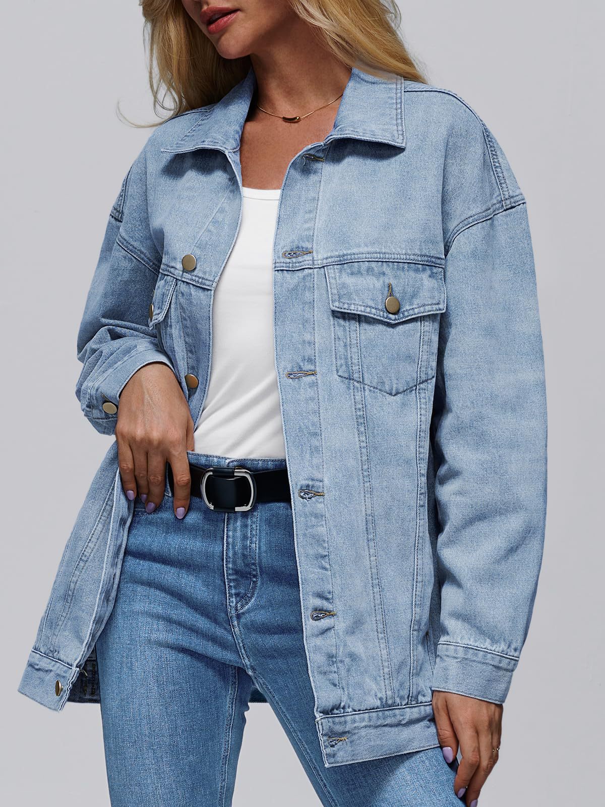 Light blue denim jacket with button front, flap chest pocket, long sleeves and collar