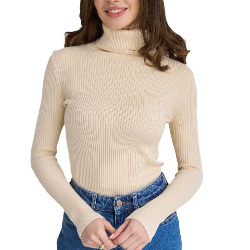 Cream ribbed turtleneck knit sweater with long sleeves and close fit