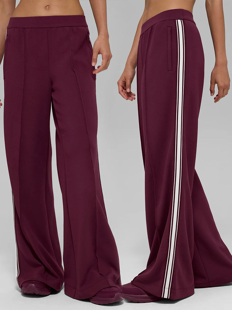 Wine red wide-leg pants with white side stripe and elastic waistband