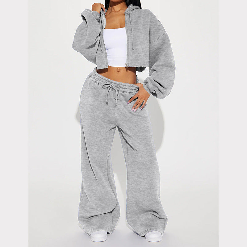 Women’s light gray zip-front cropped hoodie and drawstring sweatpants set