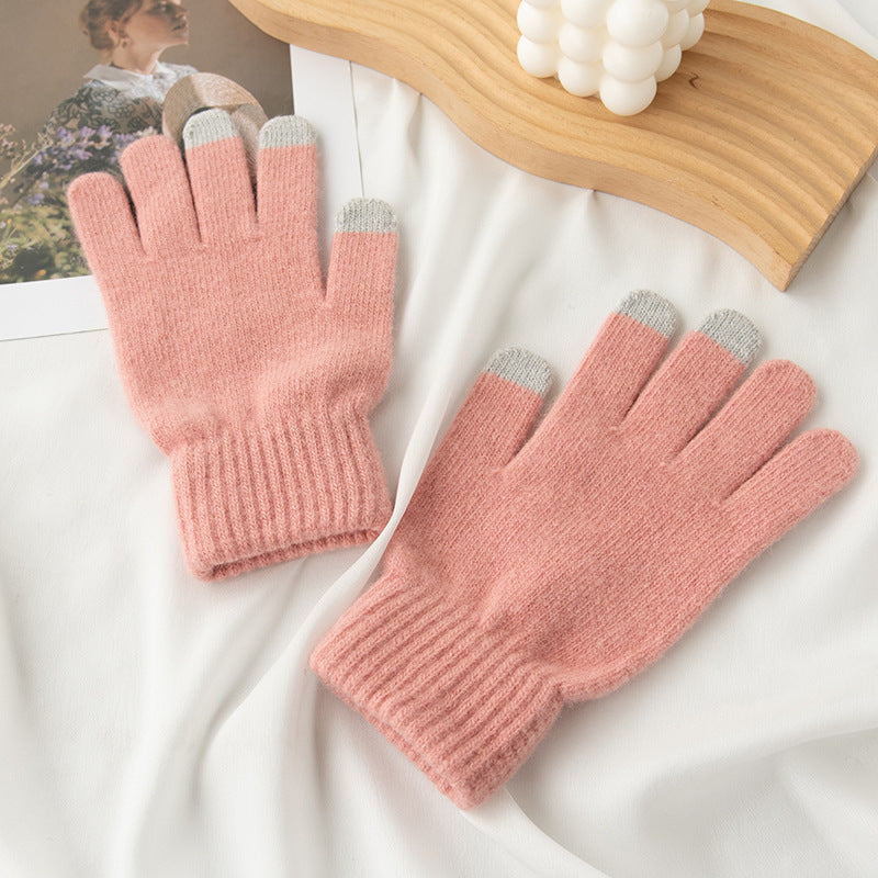 Blush pink knit gloves with gray-tipped fingers and ribbed cuff