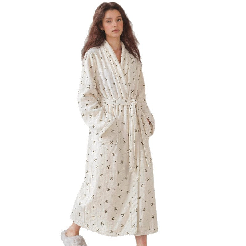 Women’s long flannel bathrobe in cream with small star-style print, belt tie and pockets
