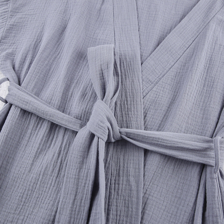 Grey gauze wrap robe detail: gathered waist with braided tie knot and overlapping fabric