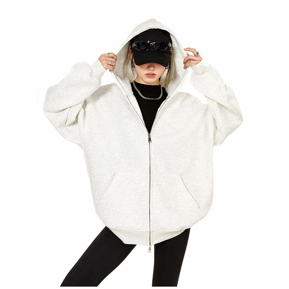 Light gray zip-up hoodie sweatshirt with front pockets, full-length zipper, and hood.