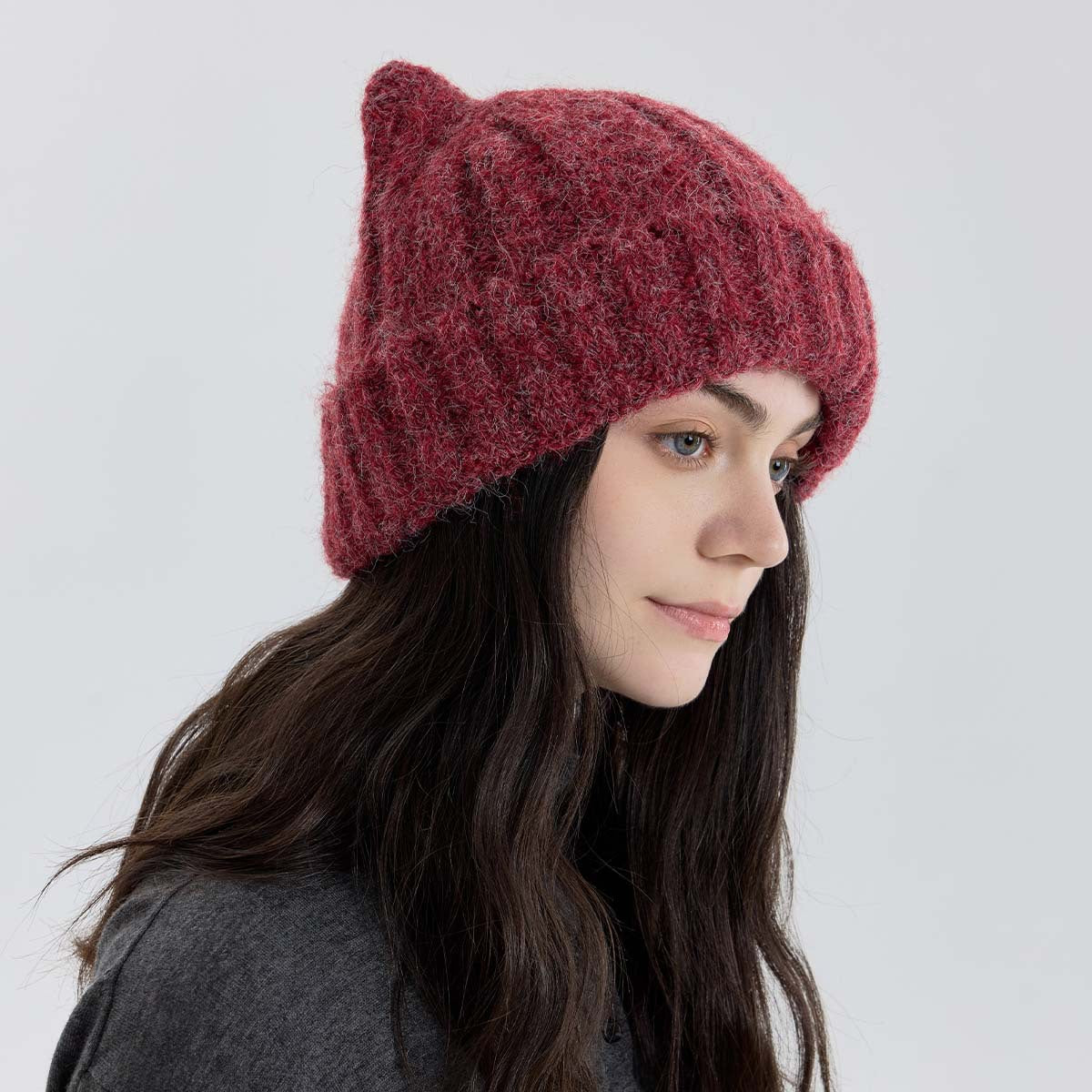Dark maroon cat-ear knit beanie with thick wool-like texture and ribbed band