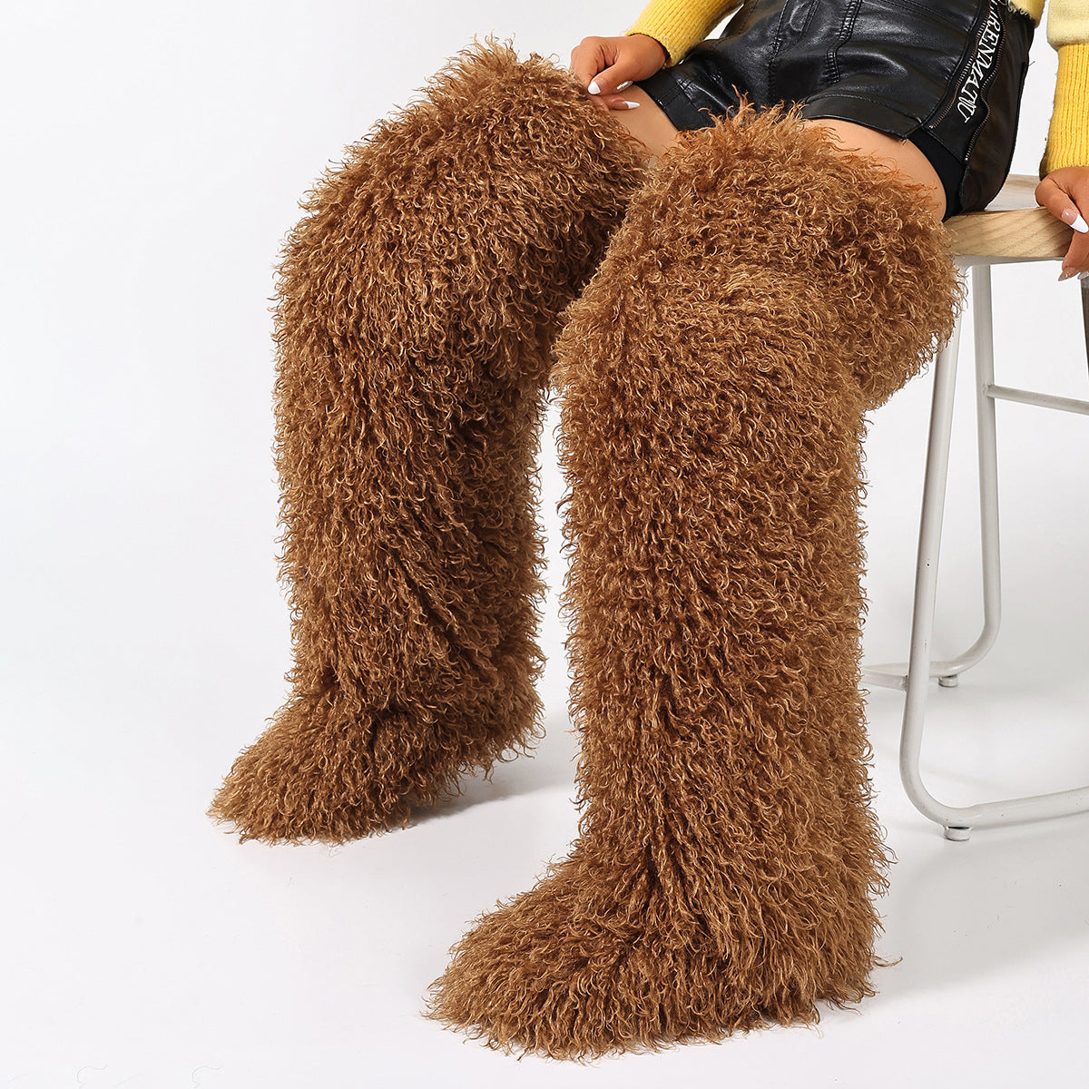 Brown curly faux fur thigh-high boots