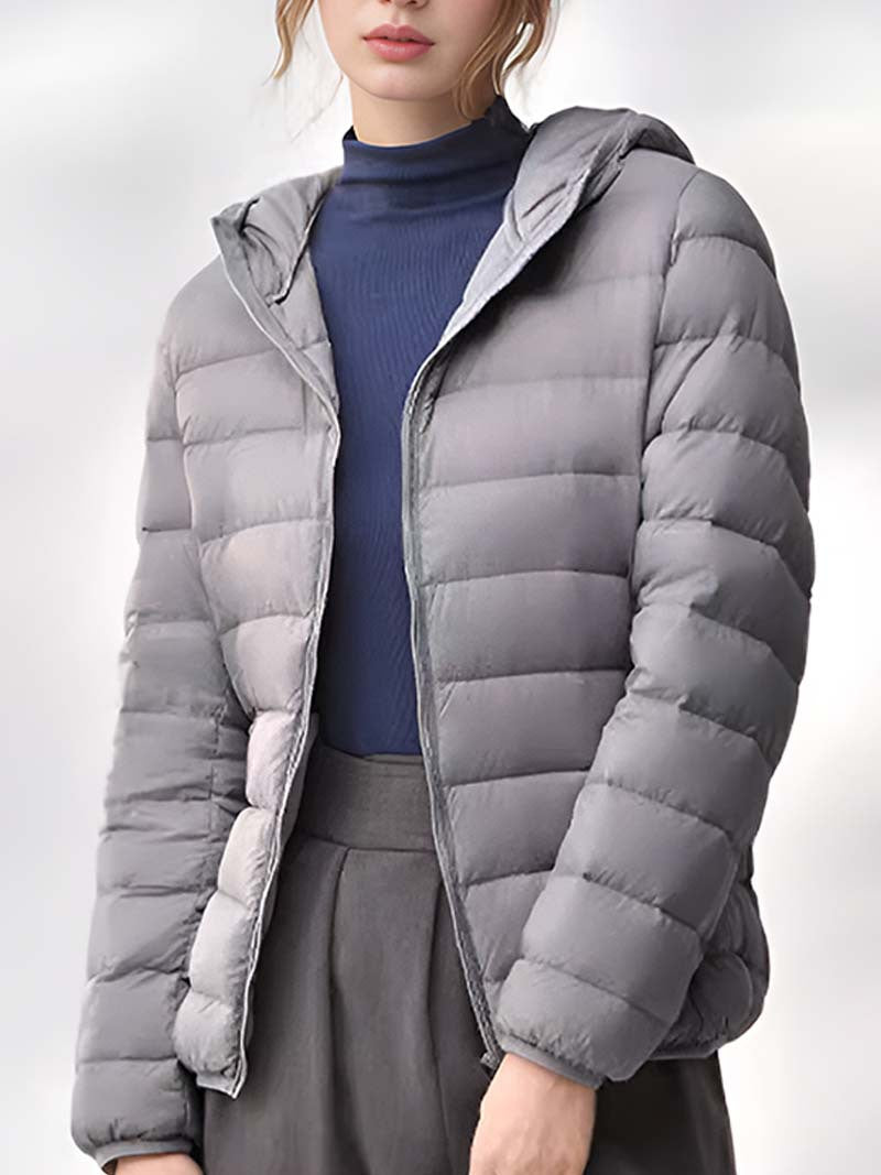 Women's light gray hooded down jacket with horizontal quilting and front zipper.