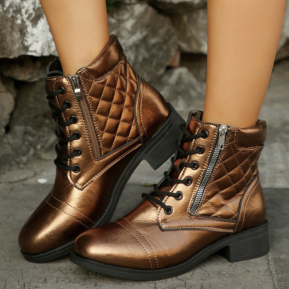 Brown-gold quilted short boots with side zipper, lace-up front, and rugged sole