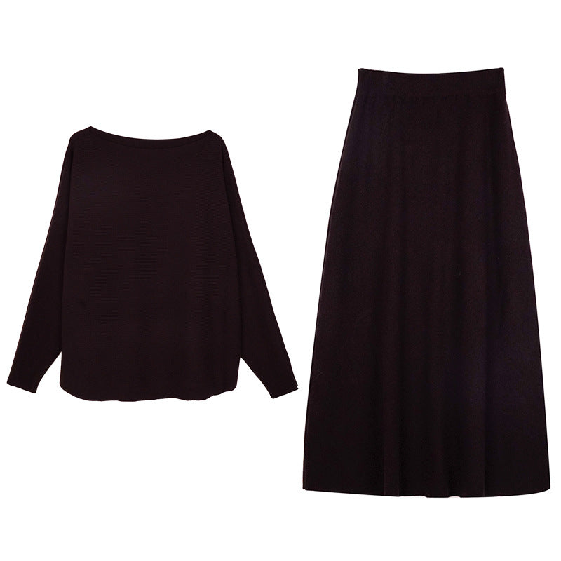 Black knit maxi skirt with elastic waistband and flowing A-line silhouette