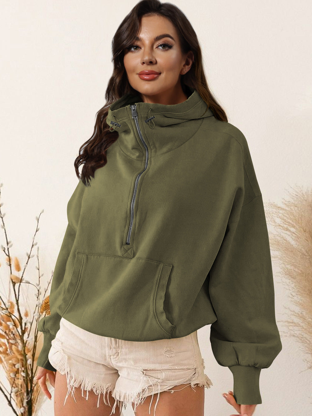 Army green hooded zip sweatshirt with drawstring and front kangaroo pocket