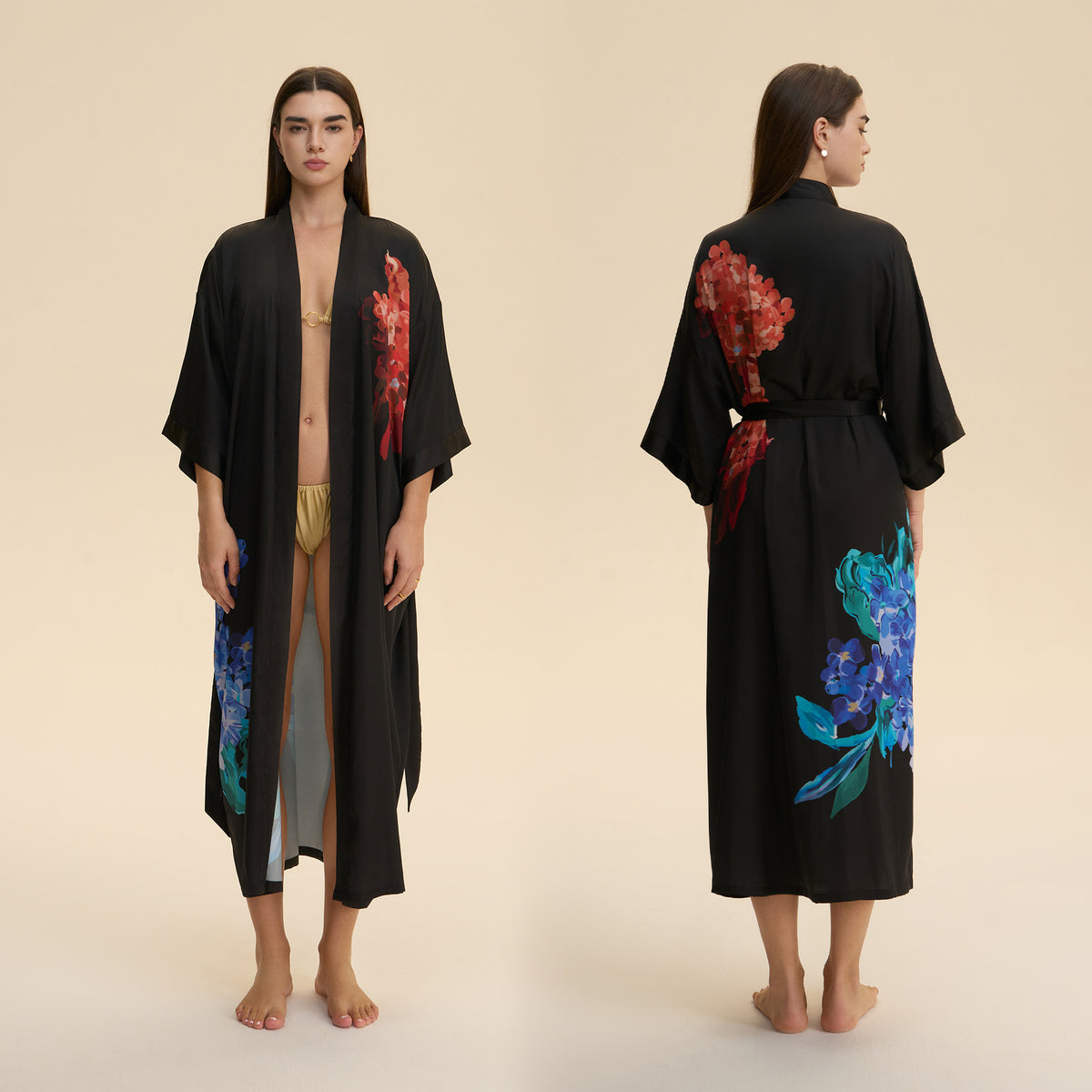 Black satin long robe with floral print back and blue hem panel, tied belt