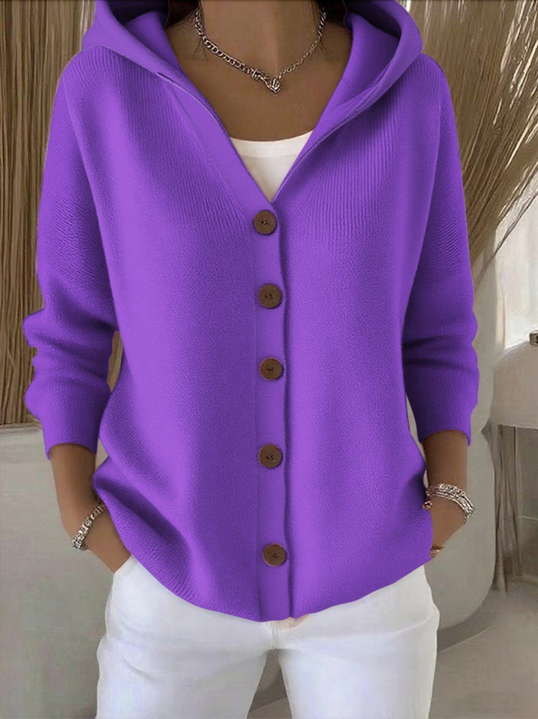 Purple hooded knit cardigan with button-front placket and long sleeves