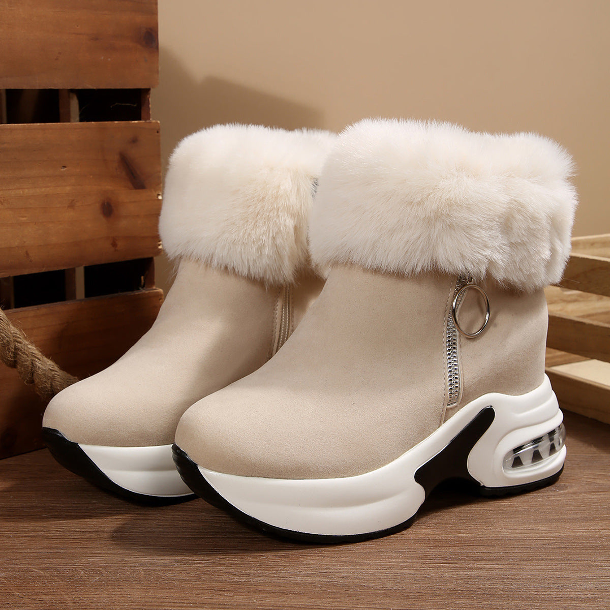 Beige fleece-lined snow boots with side zipper, white faux-fur cuffs, chunky white platform sole