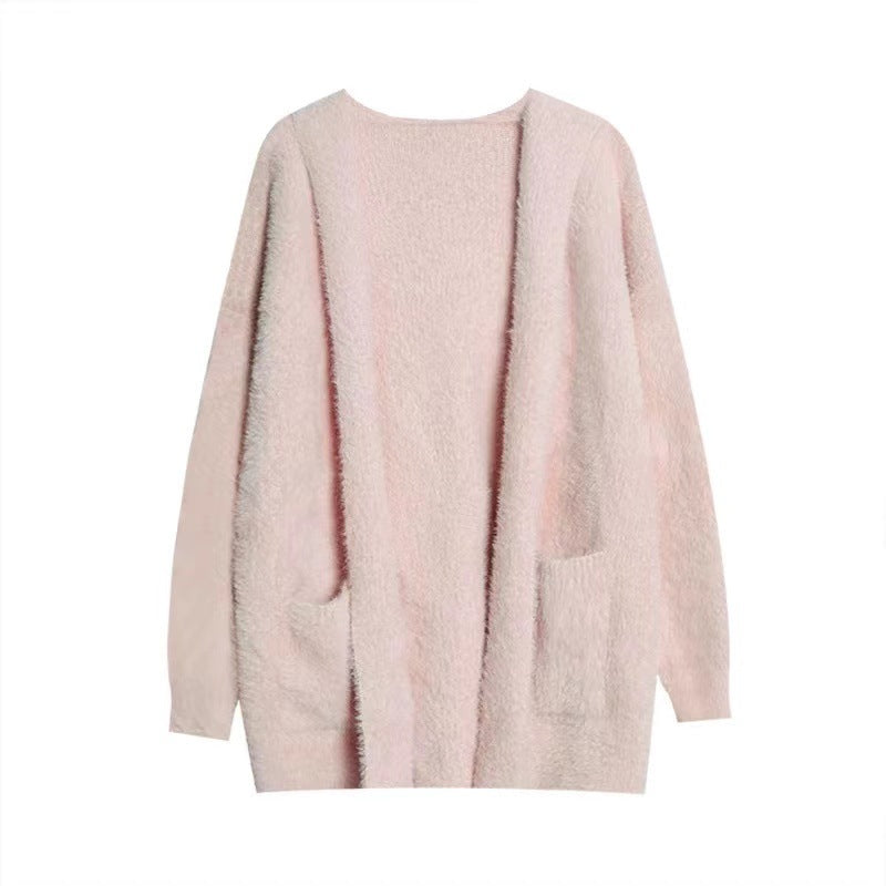 Oversized light pink wool cardigan with shawl collar, open front, side pockets, chunky knit