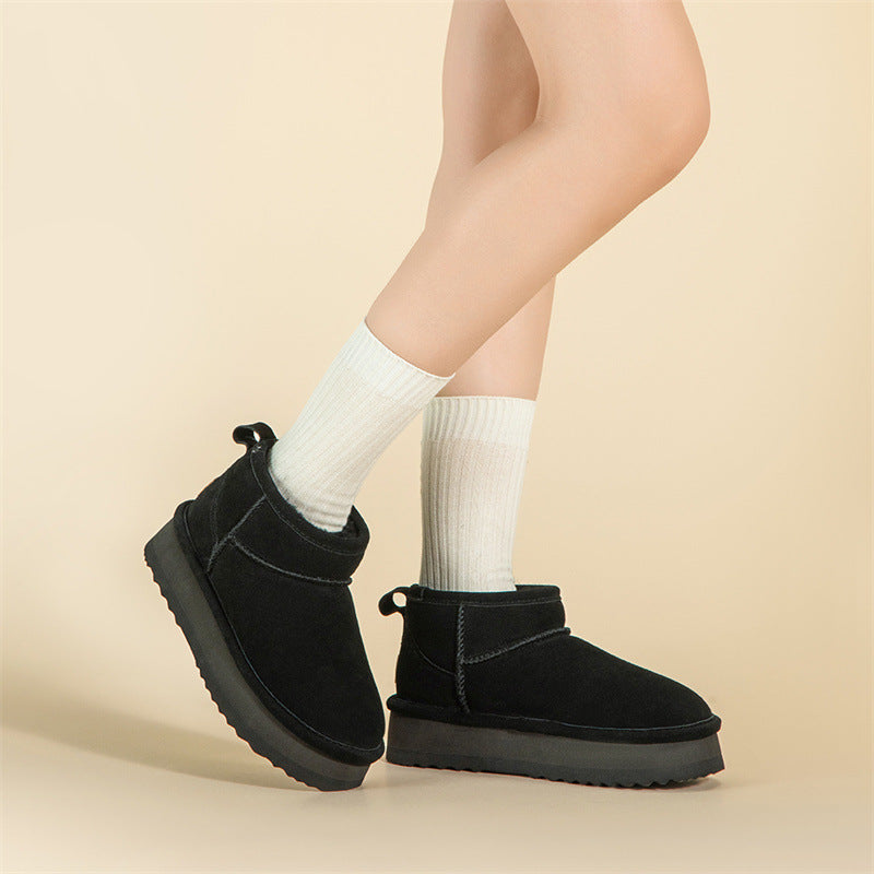 Black suede slip-on snow boots with fleece lining and thick rubber sole