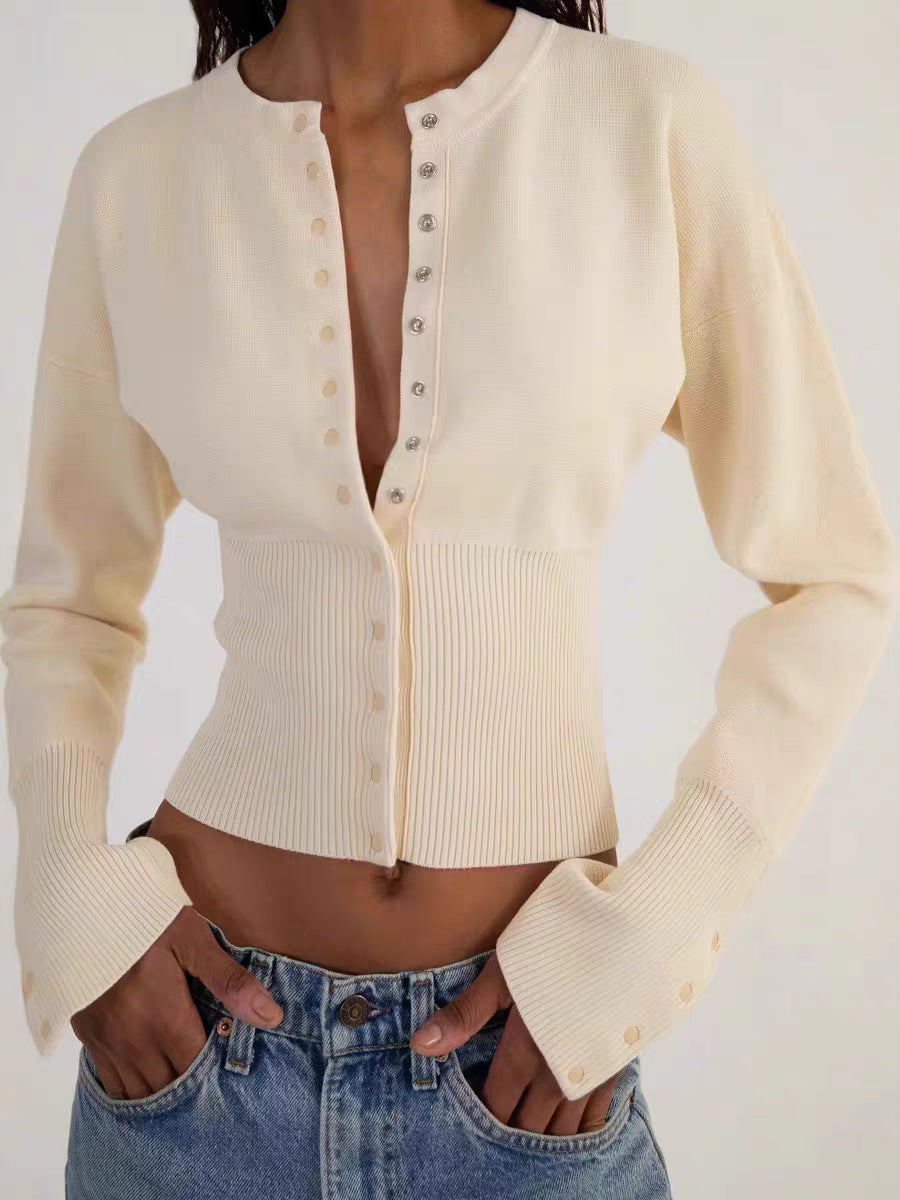Women’s cream knitted cardigan sweater with button-front placket and ribbed hem