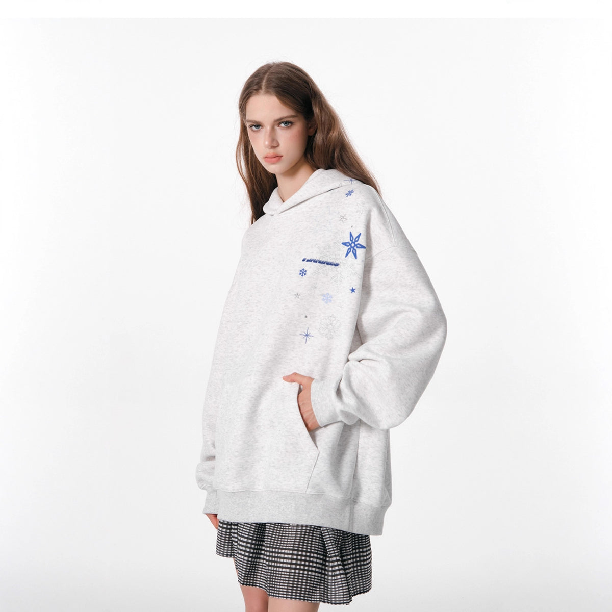 Light gray cotton hoodie with blue snowflake embroidery, front pocket, relaxed fit