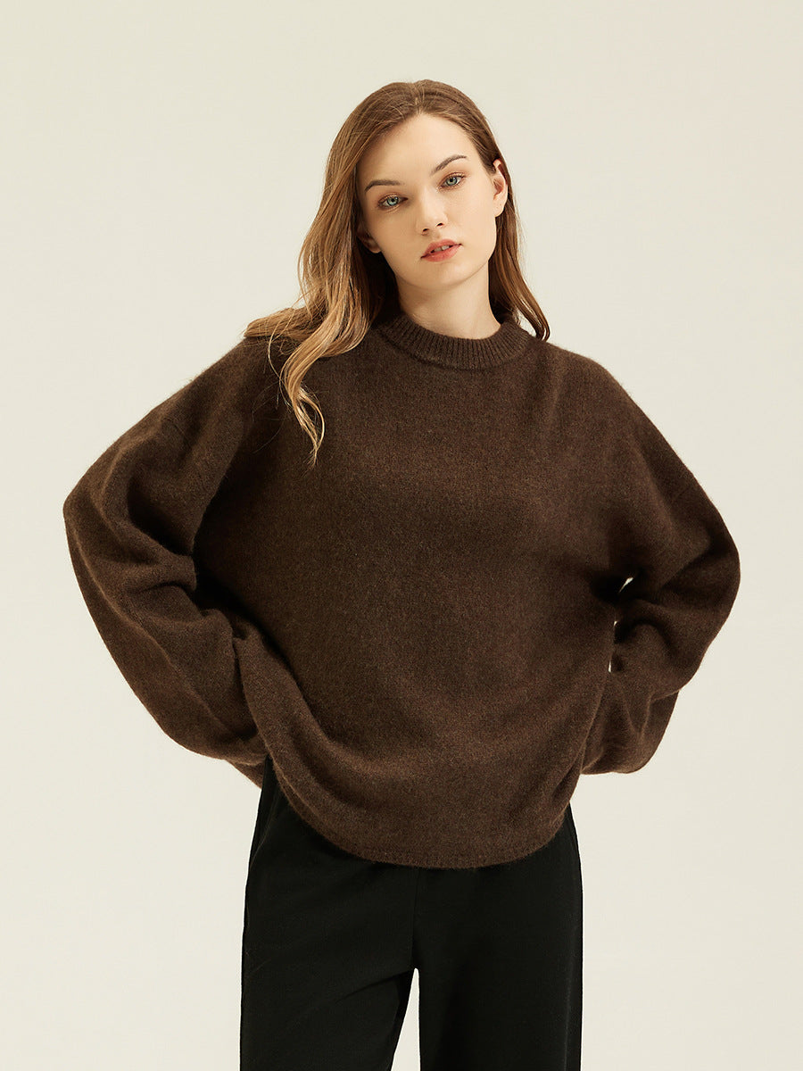 Brown women's loose knit pullover sweater with round ribbed neckline and long sleeves