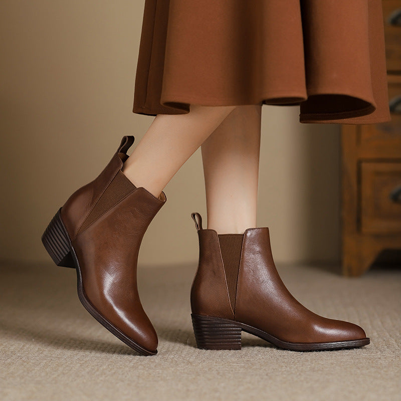 Brown leather Chelsea boots with side elastic panels and low block heel
