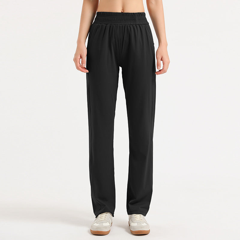 Women's loose sports trousers, black, elastic waistband, straight loose leg