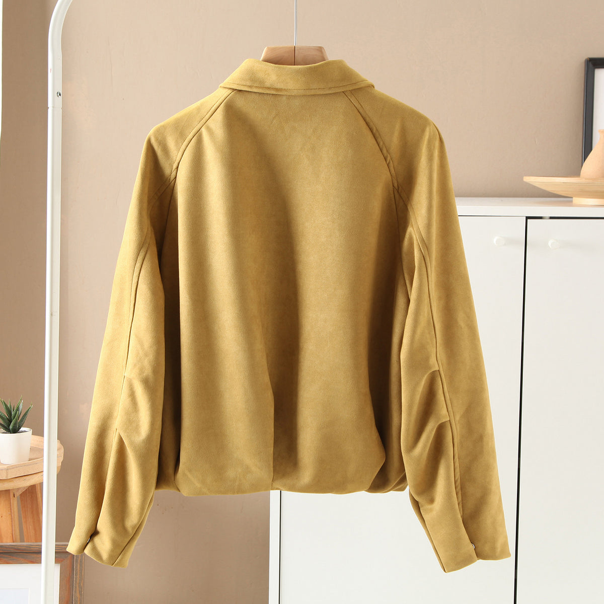 Yellow faux suede bomber jacket with stand collar and contrast topstitching, oversized cropped