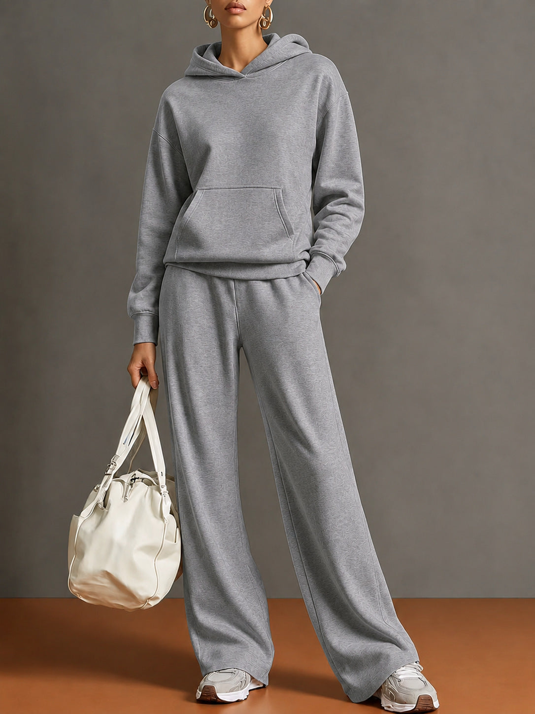 Women's gray hooded sweatshirt and wide-leg pant set, loose fit with front pocket