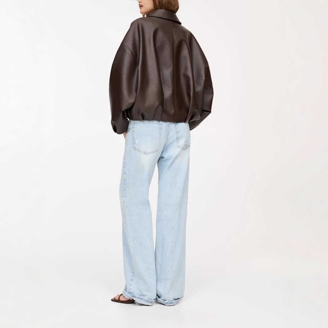 Brown faux leather pilot jacket back view with stand collar and balloon sleeves