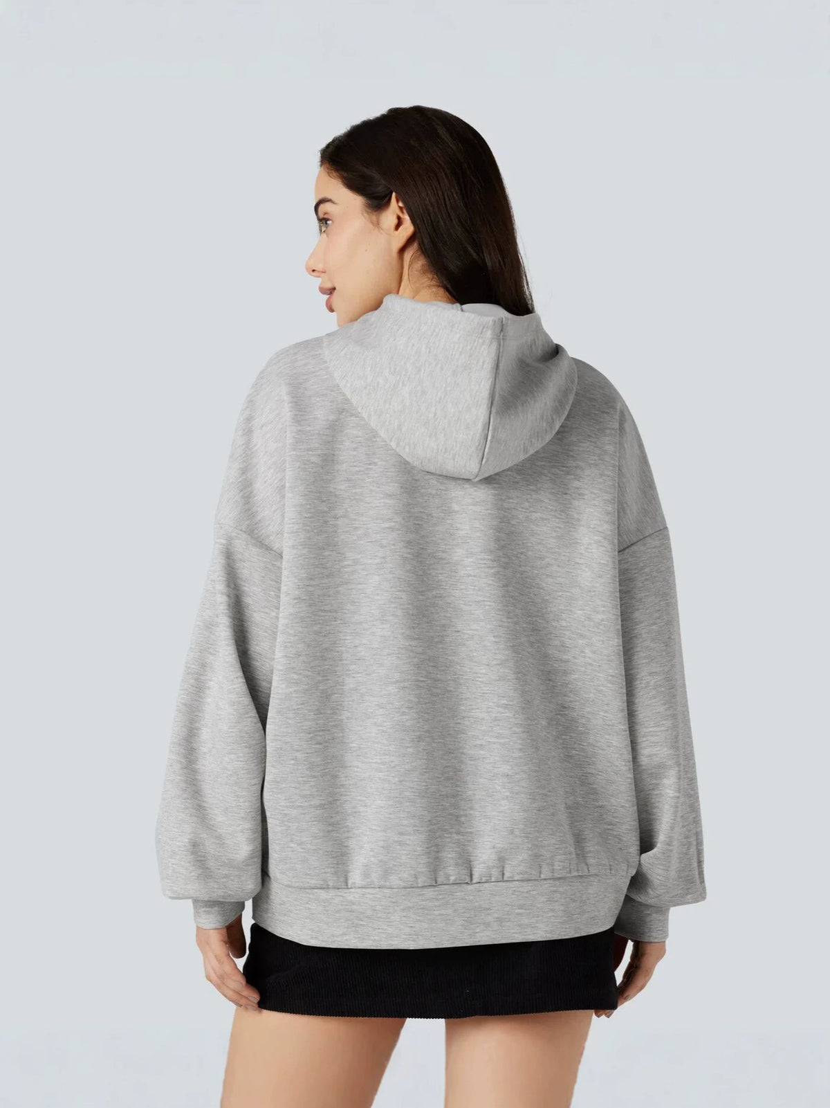 Light gray hooded pullover sweatshirt with rear view of hood and relaxed sleeves