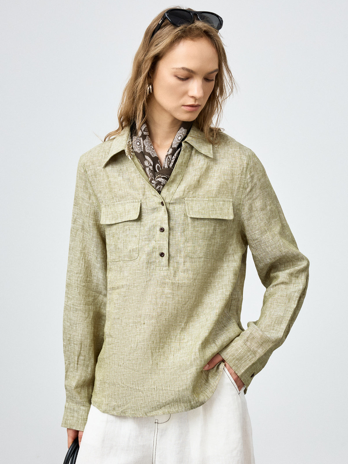 Women’s olive linen button-up shirt with two chest pockets and neck scarf