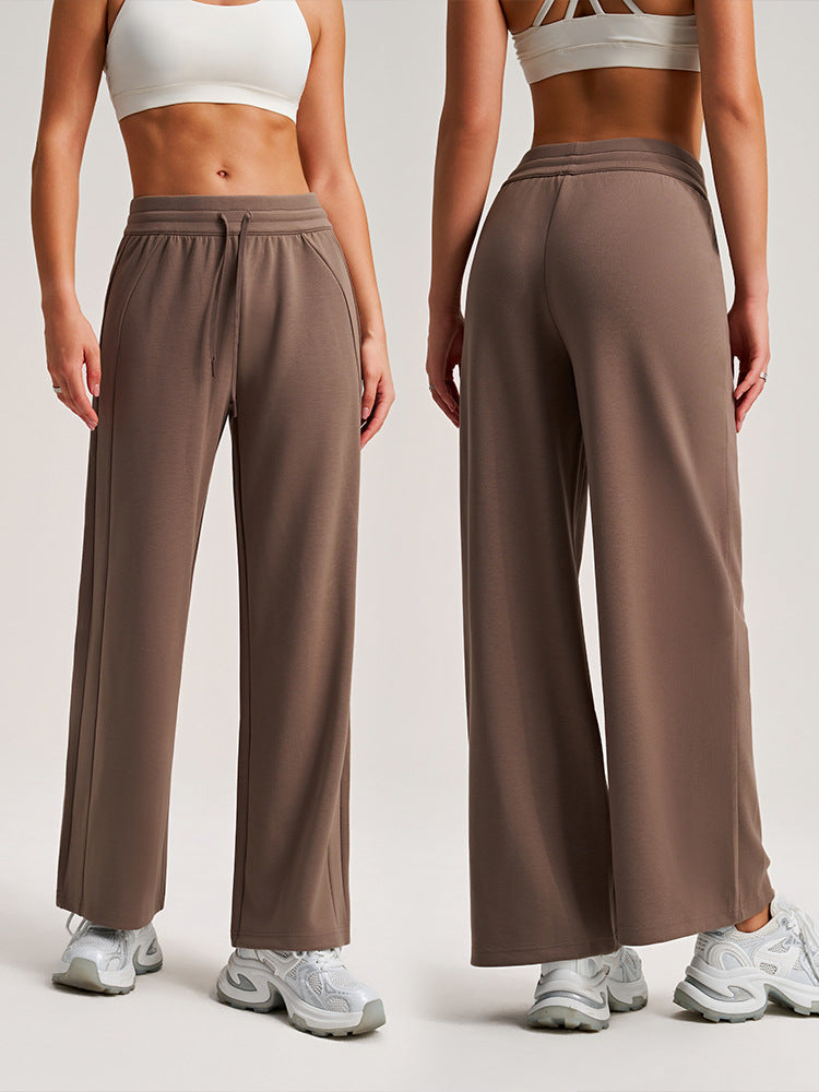 Dark brown wide-leg drawstring sweatpants with elastic waistband, high-rise, side view