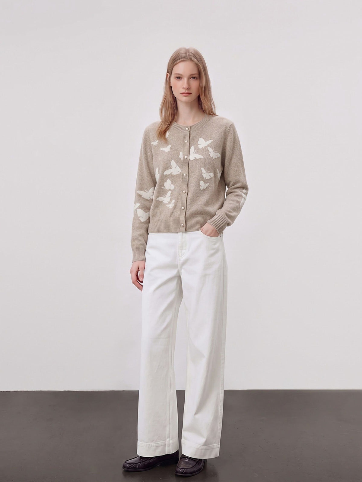 Women’s sand knit cardigan with butterfly print, crew neckline, button front