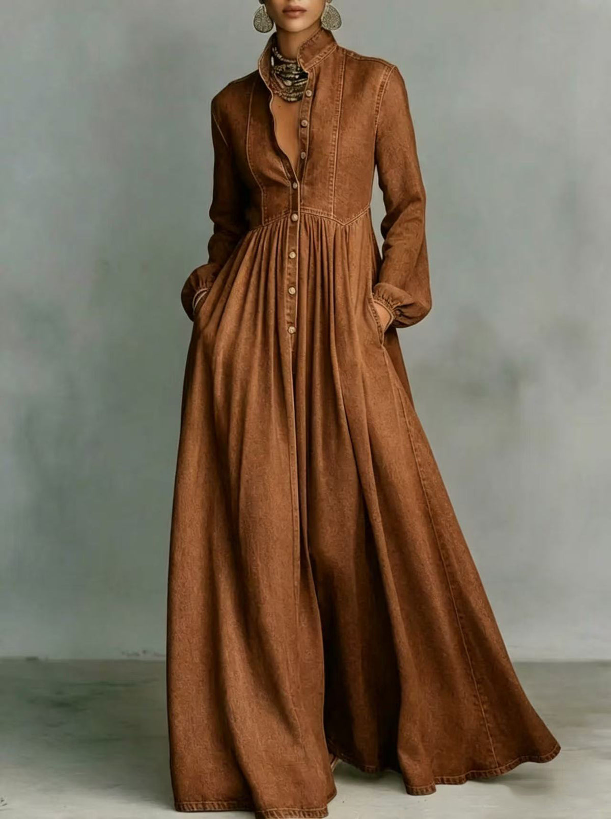 Dark brown long denim maxi dress with V-neck, button front, long sleeves, gathered waist