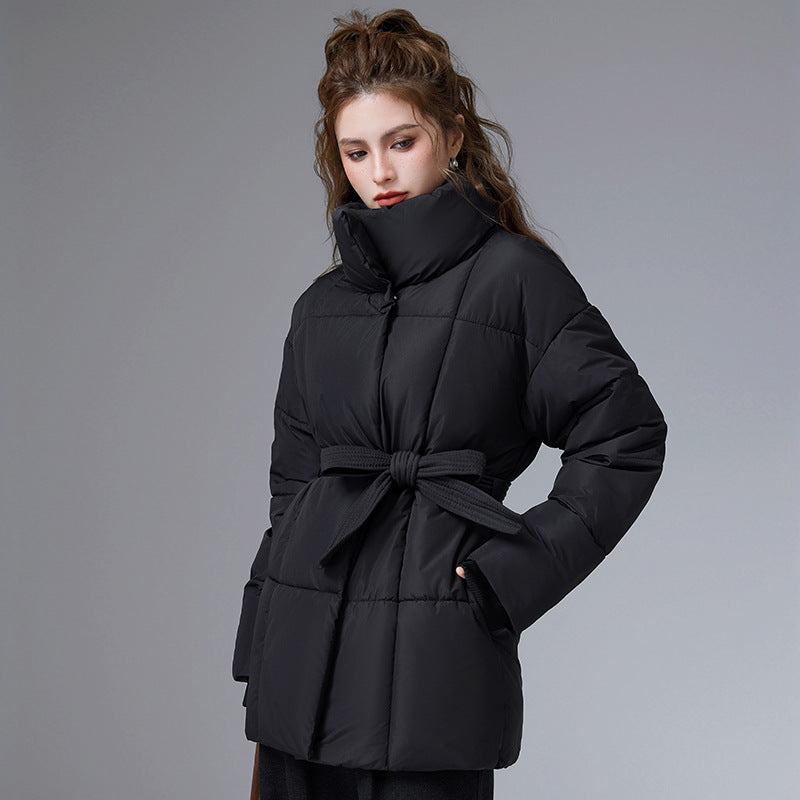 Women's black cotton puffer coat with stand collar and tie belt