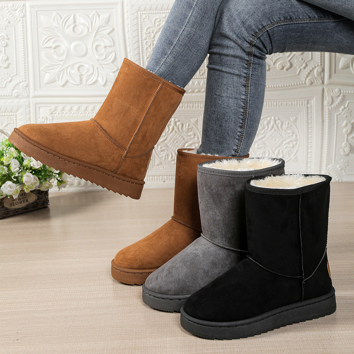 Women’s mid-calf fleece-lined slip-on snow boots in brown, gray, and black