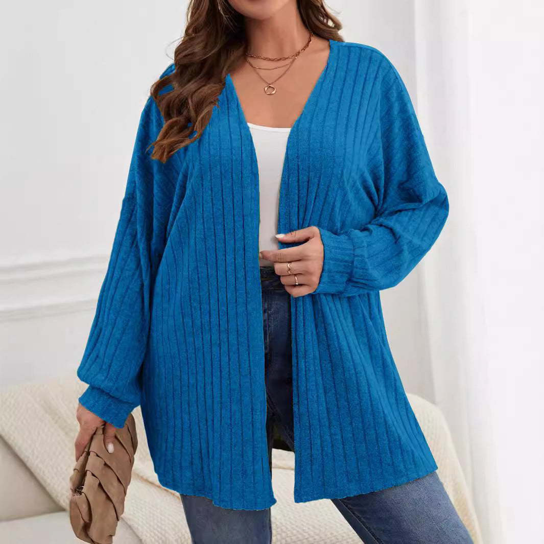 Royal blue plus-size knitted long-sleeve jacket with ribbed texture, open front, mid-length.