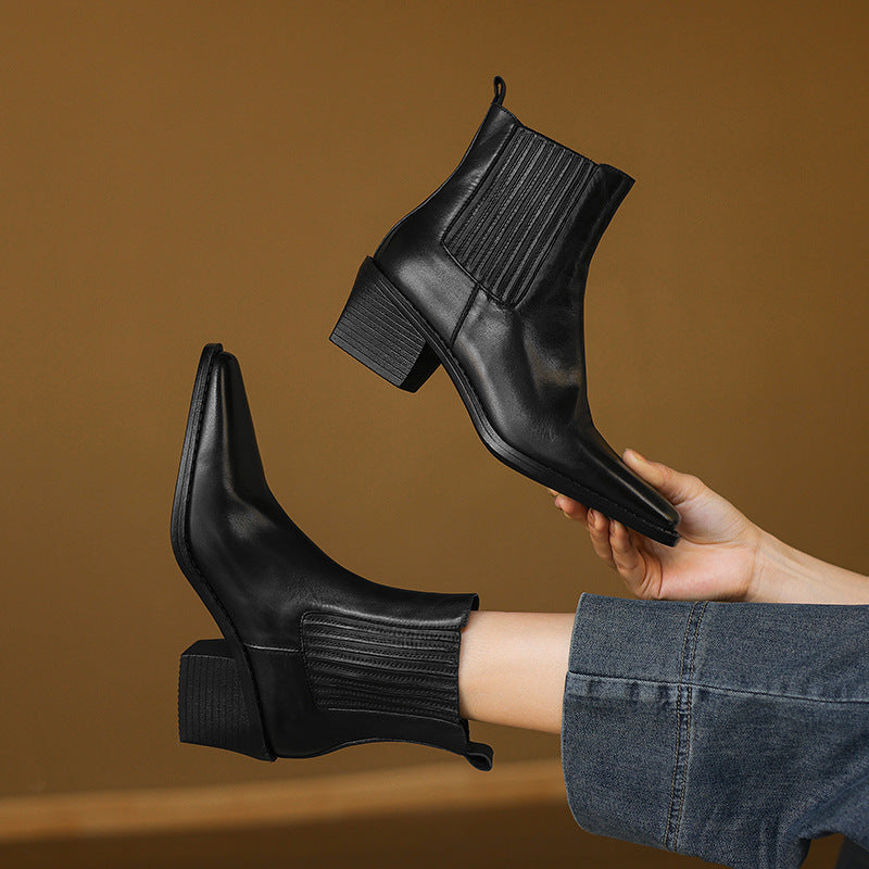 Black leather Chelsea boots with square toe and thick block heel, stretchy side gore