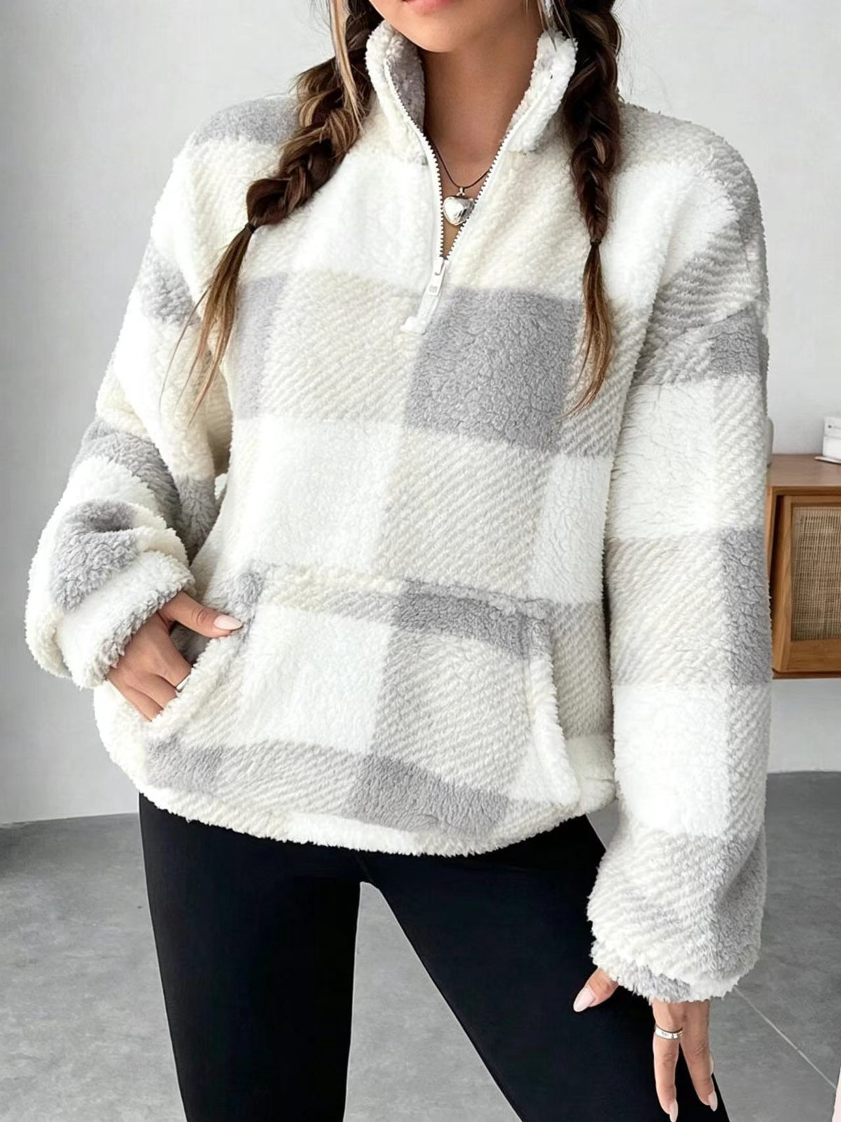 White and light gray plaid fuzzy quarter-zip sweatshirt with half-open collar for women