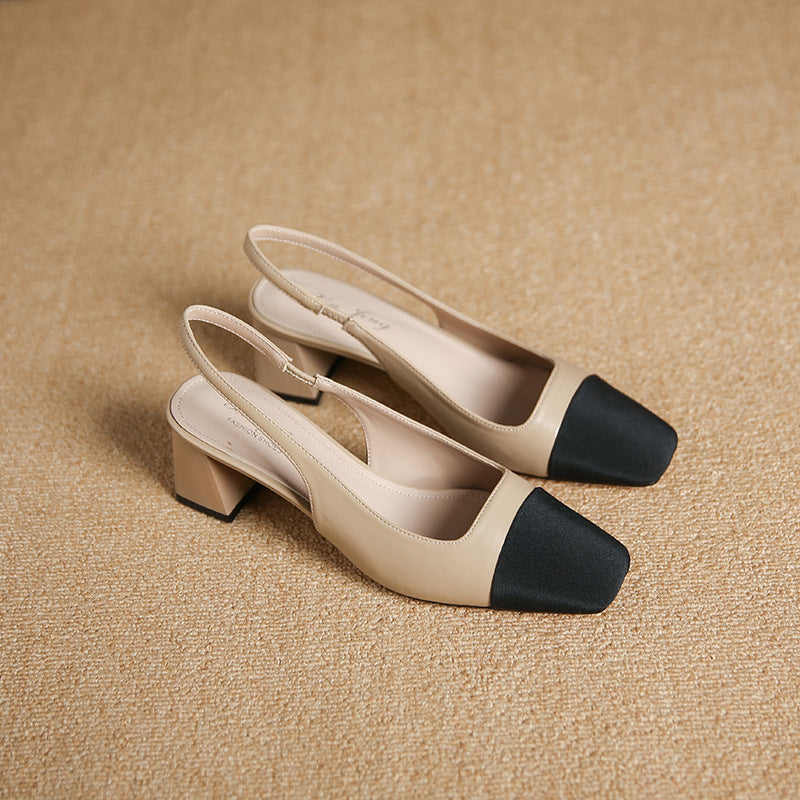 Pair of women’s color-block square-toe slingback chunky heels, beige upper with black toe