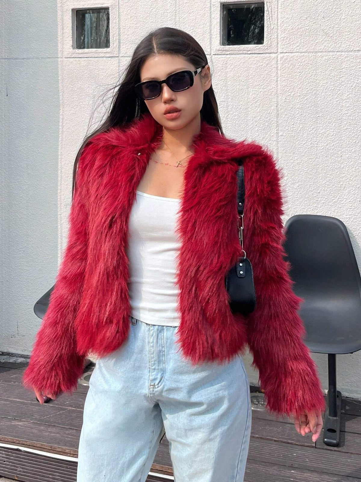 Red shaggy faux fur cropped jacket with open front and long sleeves