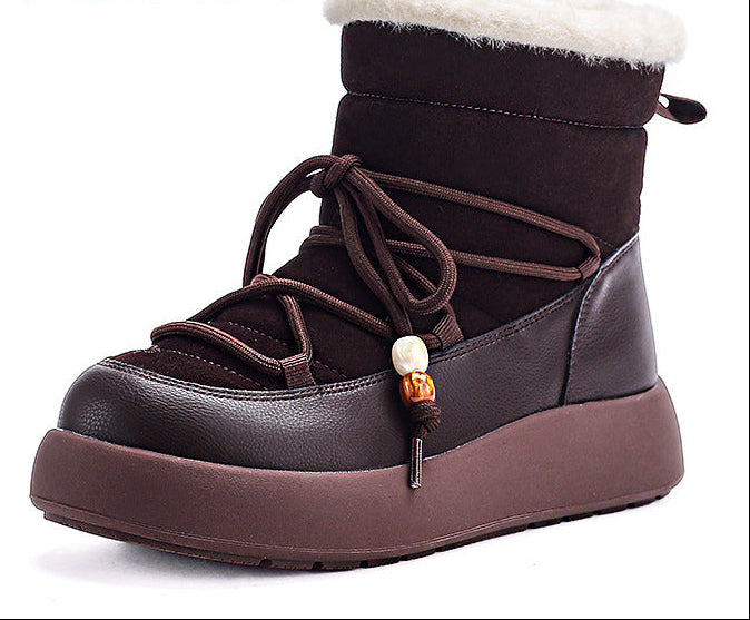 Black and dark brown lace-up snow boots with thick sole and fuzzy cuff