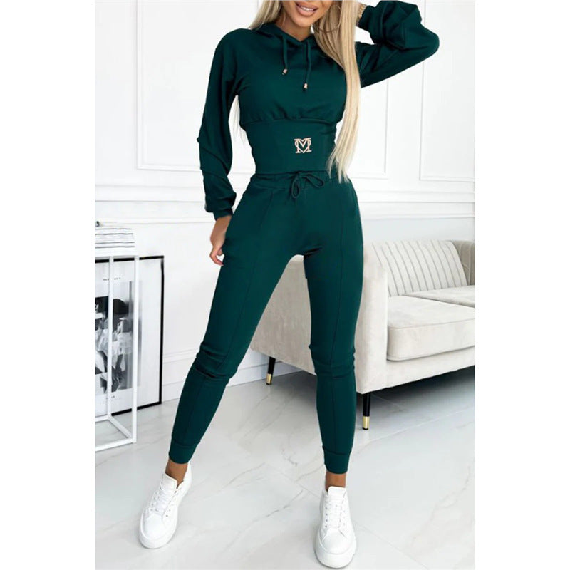 Dark green hooded top and long jogger pants set with drawstring waist and logo.